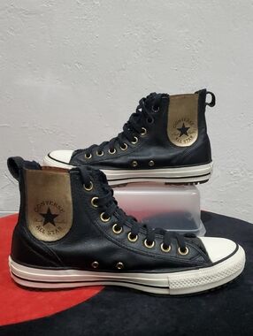 Converse Black Leather High Top Sneakers with Gold Metallic Patch